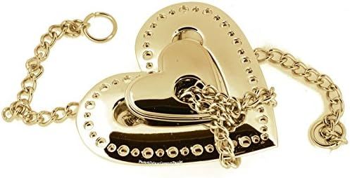 Heart hanayama cast metal puzzle assembled on a work bench