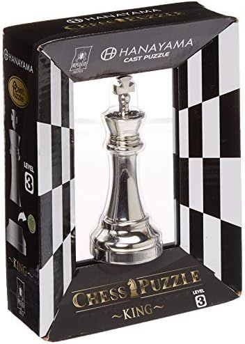 King Chesspiece hanayama cast metal puzzle assembled on a work bench